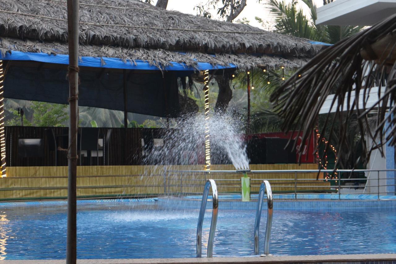 V Resorts Gulmohar Cottages Goa Калангут Экстерьер фото